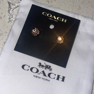 Gorgeous rose gold Coach earrings